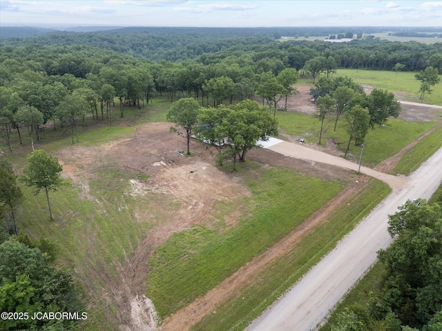 7058 County Road 409, Fulton, MO 65251 - aerial view of sparsely populated area with a heavily wooded area