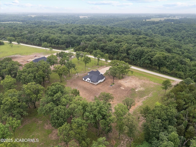 7058 County Road 409, Fulton, MO 65251 - overview of rural landscape featuring a heavily wooded area
