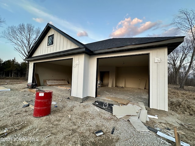 garage featuring driveway