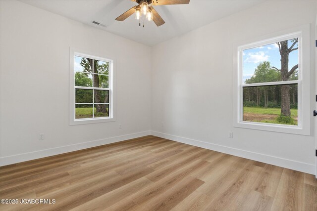 7058 County Road 409, Fulton, MO 65251 - spare room featuring light wood-style floors and ceiling fan