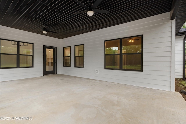 7058 County Road 409, Fulton, MO 65251 - view of patio featuring ceiling fan