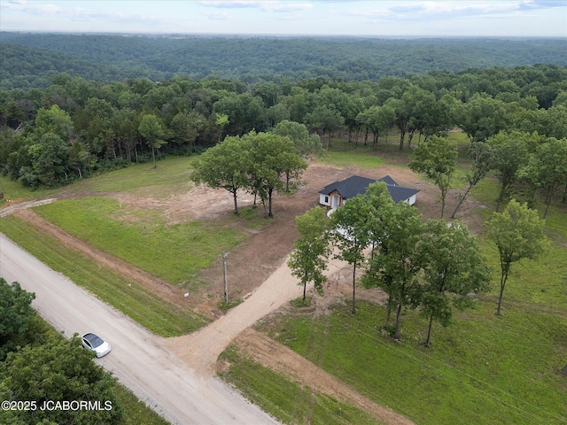 7058 County Road 409, Fulton, MO 65251 - aerial view of sparsely populated area with a forest