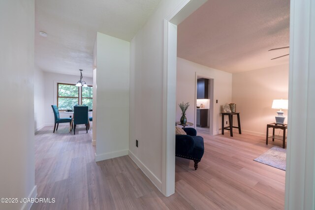 232 Pheasant Ln, Holts Summit, MO 65043 - hallway featuring wood finished floors