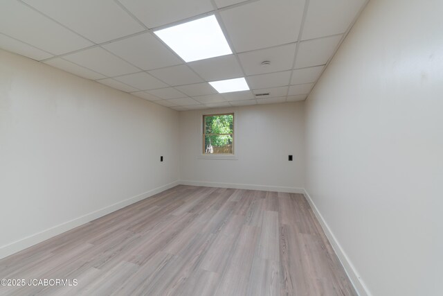 232 Pheasant Ln, Holts Summit, MO 65043 - spare room with light wood finished floors and a paneled ceiling