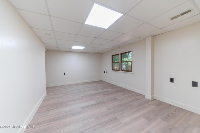 232 Pheasant Ln, Holts Summit, MO 65043 - unfurnished room featuring a paneled ceiling and light wood-type flooring