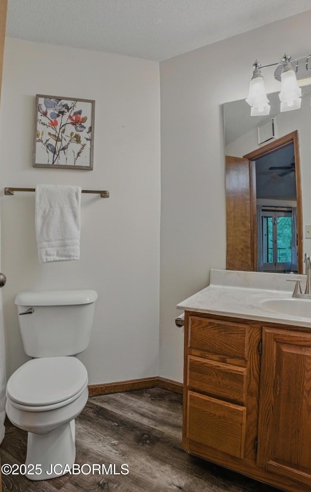 808 Park De Ville Pl, Columbia, MO 65203 - bathroom with vanity, wood finished floors, and a textured ceiling