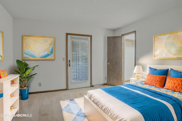 808 Park De Ville Pl, Columbia, MO 65203 - carpeted bedroom featuring access to exterior and baseboards