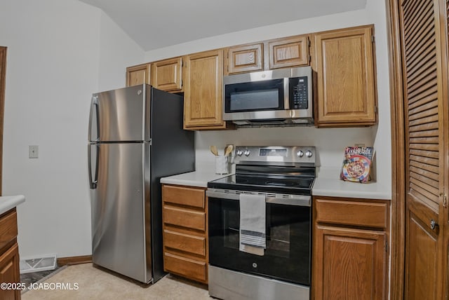808 Park De Ville Pl, Columbia, MO 65203 - kitchen with appliances with stainless steel finishes and light countertops
