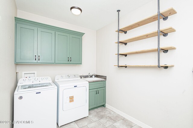 1220 Markway Mills Ct, Jefferson City, MO 65101 - laundry area with washing machine and clothes dryer and cabinet space