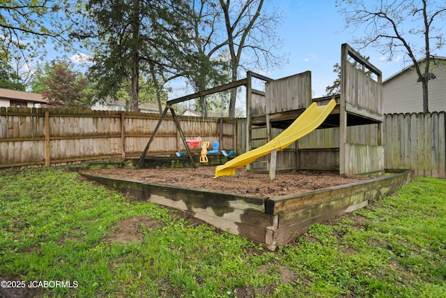 view of play area featuring a fenced backyard
