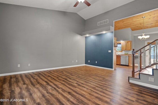 unfurnished living room with dark wood-style flooring, visible vents, stairway, baseboards, and ceiling fan with notable chandelier