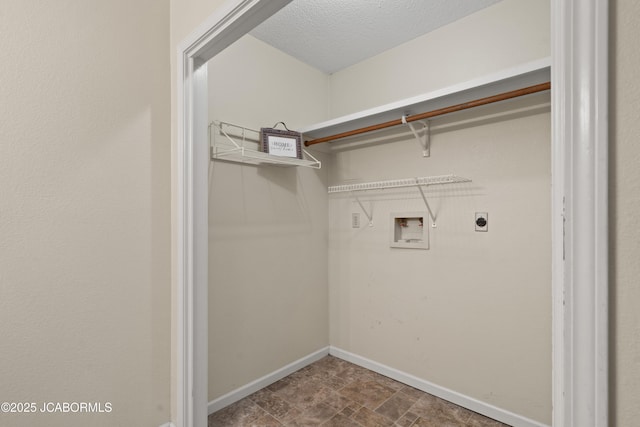 laundry room with electric dryer hookup, laundry area, washer hookup, and baseboards