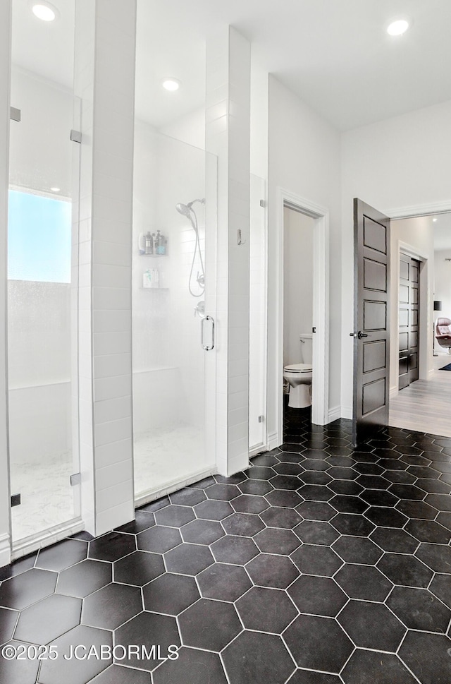 5621 Lightpost Dr, Columbia, MO 65201 - bathroom with a stall shower and recessed lighting