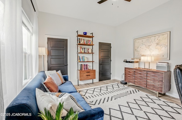 5621 Lightpost Dr, Columbia, MO 65201 - living area featuring wood finished floors and ceiling fan