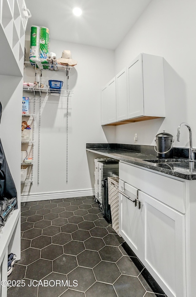 5621 Lightpost Dr, Columbia, MO 65201 - washroom with a sink and recessed lighting