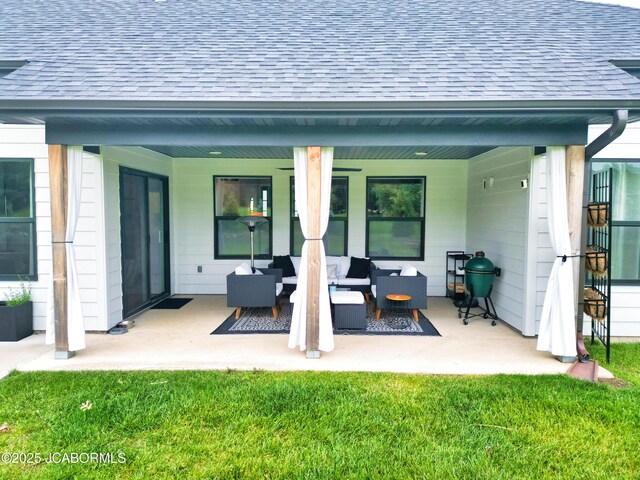 5621 Lightpost Dr, Columbia, MO 65201 - rear view of property with a shingled roof, an outdoor hangout area, a patio area, and a lawn