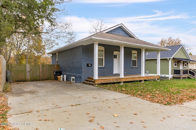 bungalow-style home with a porch