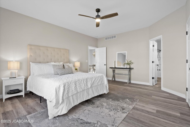 bedroom with visible vents, ceiling fan, baseboards, and wood finished floors