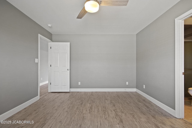 unfurnished bedroom with hardwood / wood-style flooring and ceiling fan