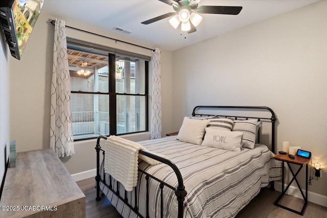 1055 Topsider Ln Unit 212, Osage Beach, MO 65065 - bedroom featuring wood finished floors and ceiling fan