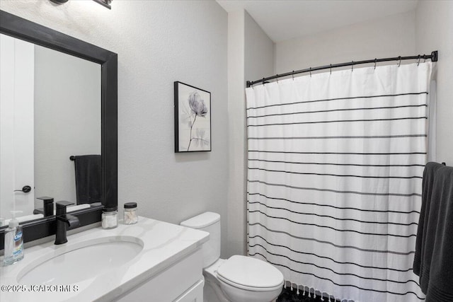 1055 Topsider Ln Unit 212, Osage Beach, MO 65065 - bathroom with vanity, a textured wall, and a shower with shower curtain
