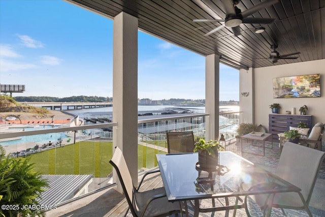 1055 Topsider Ln Unit 212, Osage Beach, MO 65065 - balcony with a water view and ceiling fan