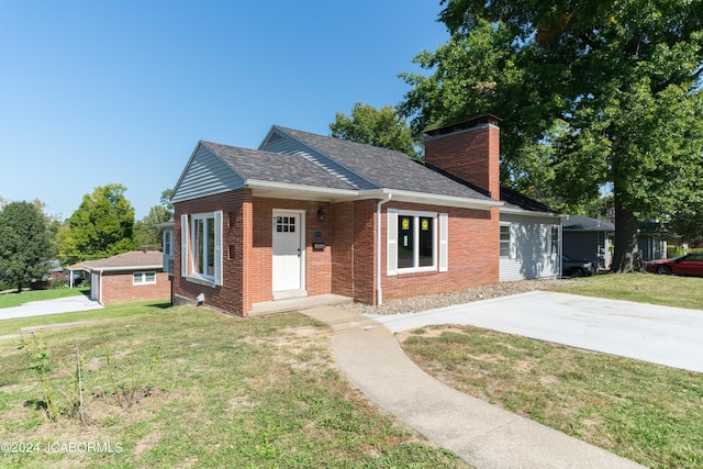 view of front of home with a front yard