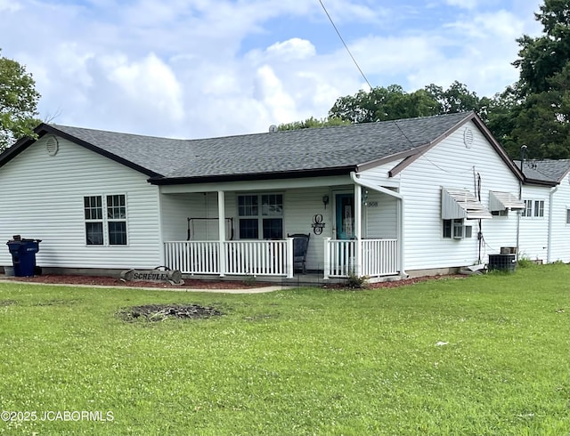 508 S Poplar St, Chamois, MO 65024 - view of front of property with covered porch, a front lawn, and a shingled roof
