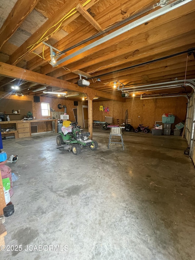 508 S Poplar St, Chamois, MO 65024 - garage featuring a garage door opener