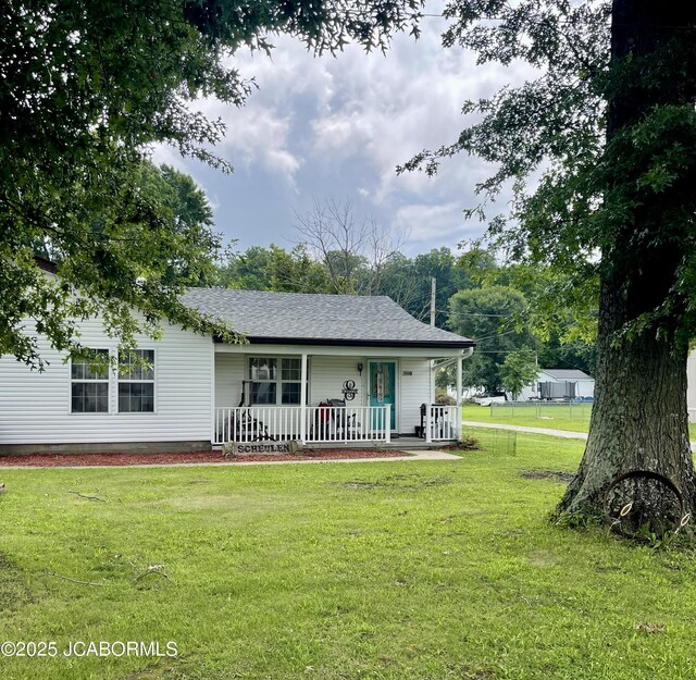 508 S Poplar St, Chamois, MO 65024 - view of front of house featuring covered porch, a front yard, and a shingled roof