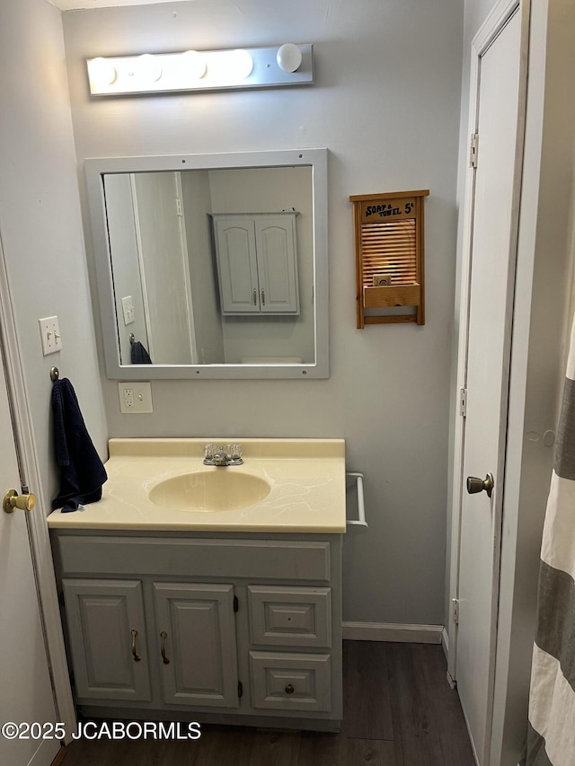 508 S Poplar St, Chamois, MO 65024 - bathroom featuring vanity and wood finished floors