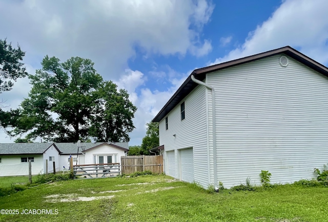 508 S Poplar St, Chamois, MO 65024 - view of property exterior with an attached garage