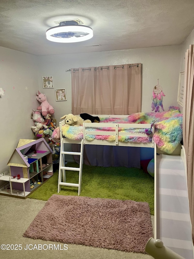 508 S Poplar St, Chamois, MO 65024 - bedroom featuring carpet and a textured ceiling