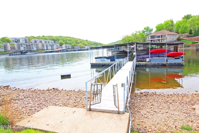 dock area featuring a water view and boat lift