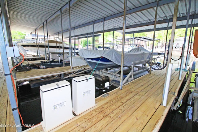 view of dock featuring boat lift