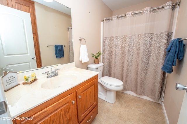 full bath with tile patterned flooring, curtained shower, toilet, and vanity