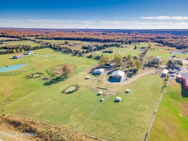 birds eye view of property featuring a rural view