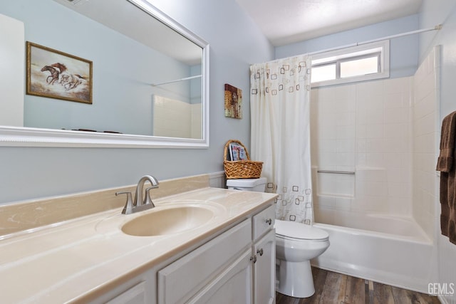 3113 Raccoon Dr, Lake Isabella, CA 93240 - full bathroom featuring vanity, toilet, shower / tub combo, and wood finished floors