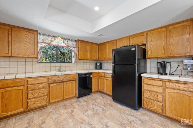 3113 Raccoon Dr, Lake Isabella, CA 93240 - kitchen featuring black appliances, a sink, tasteful backsplash, and a tray ceiling