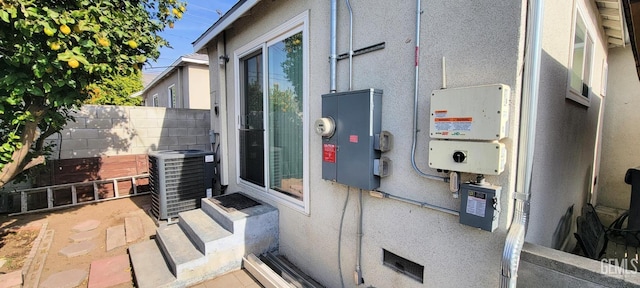 view of home's exterior with central AC unit