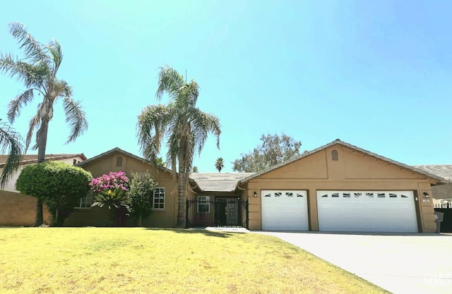 7205 Colony Park Dr, Bakersfield, CA 93313 - single story home with an attached garage, concrete driveway, and stucco siding