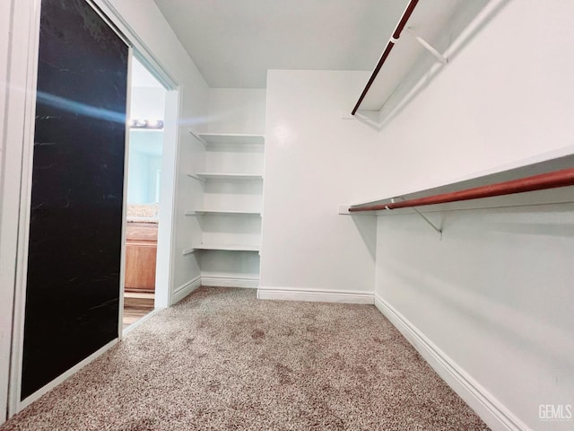 7205 Colony Park Dr, Bakersfield, CA 93313 - walk in closet featuring carpet floors