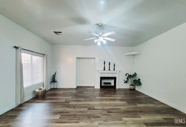 7205 Colony Park Dr, Bakersfield, CA 93313 - unfurnished living room featuring wood finished floors, ceiling fan, and a fireplace