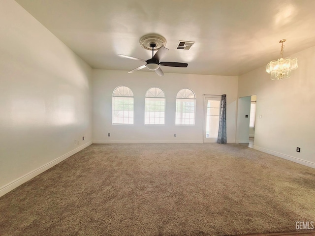 7205 Colony Park Dr, Bakersfield, CA 93313 - unfurnished room with ceiling fan, a chandelier, and light carpet