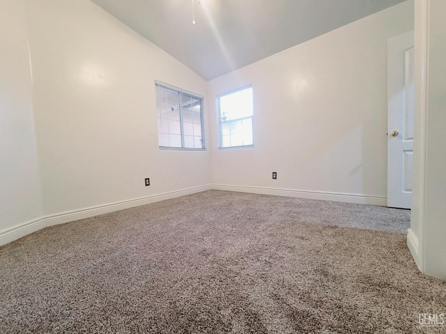 7205 Colony Park Dr, Bakersfield, CA 93313 - spare room featuring lofted ceiling and carpet floors