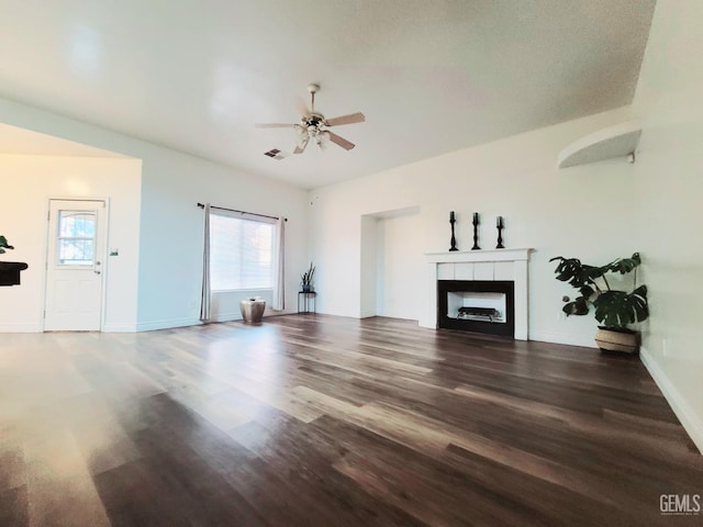 7205 Colony Park Dr, Bakersfield, CA 93313 - unfurnished living room featuring a ceiling fan, plenty of natural light, and wood finished floors