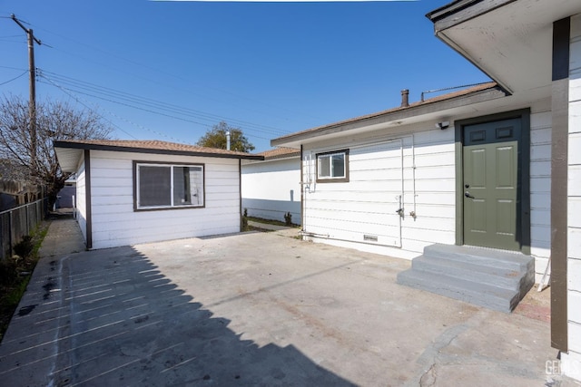 rear view of property with a patio