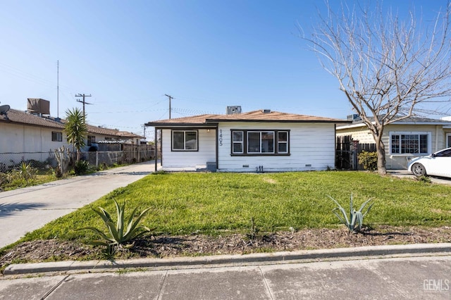 ranch-style house with a front yard