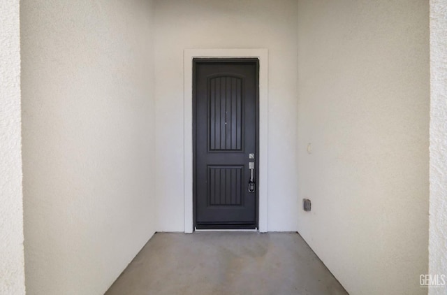 8412 Jean Anne St, Bakersfield, CA 93314 - doorway to property featuring stucco siding
