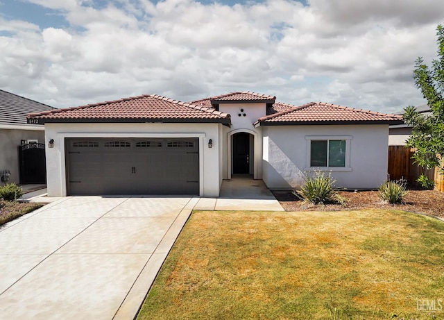 8412 Jean Anne St, Bakersfield, CA 93314 - mediterranean / spanish-style house with driveway, a garage, stucco siding, and a tile roof
